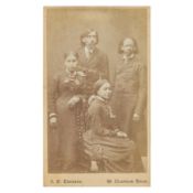 PORTRAIT ALBUM INCL. RARE CARTE-DE-VISITE OF BLACK AMERICAN MISSIONARY THOMAS JOHNSON, 1870s-1890s