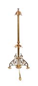 In the Manner of W.A.S Benson Arts and Crafts standard lamp with fretwork base and acanthus leaf ado