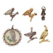 A collection of owl jewellery and a teddy bear pendant