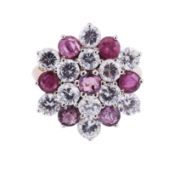 A ruby and diamond imitation cluster ring, circa 1994