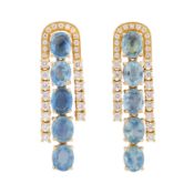 A pair of sapphire and diamond pendent earrings