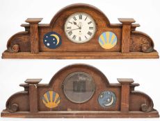 An arched oak overdoor panel