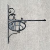 A W. H. Smith wrought iron bracket
