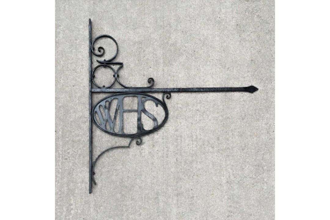 A W. H. Smith wrought iron bracket - Image 1 of 2