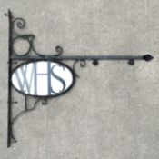 A W. H. Smith wrought iron bracket