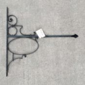 A W. H. Smith wrought iron bracket
