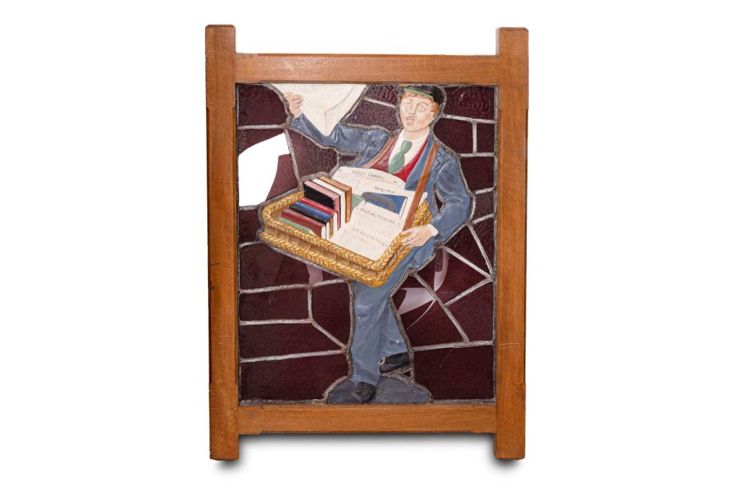 A leaded and stained glass sign depicting the W. H. Smith Newsboy - Image 1 of 4