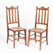 A pair of Heal & Son chairs