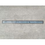 A W. H. Smith & Son acrylic sign