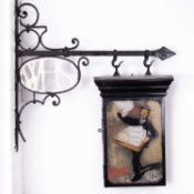 A W. H. Smith Newsboy advertising sign