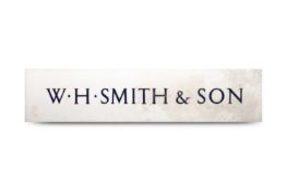A large acrylic W H Smith & Son wall sign