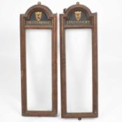 Two glazed W. H. Smith store display frames