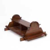 A W. H. Smith branded table top newspaper or magazine oak display stand