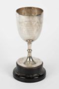 An Edwardian silver trophy cup