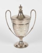 A silver trophy cup and cover