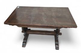 A 20th century oak dining table