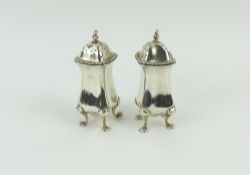 Two silver pepper pots