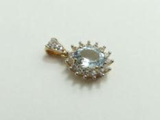 A 9ct gold aquamarine and white zircon cluster pen