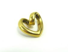 An open heart shaped pendant, 1.5cm long,