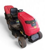 A red Countax E36 sit on lawnmower with box, written n