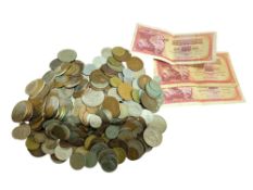 A collection of foreign and GB coins and notes, in
