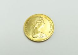 A 1973 Queen Elizabeth II Isle of Man sovereign, 8