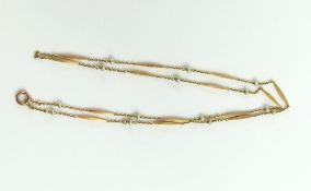 An unmarked gold pearl interval necklace (possibly