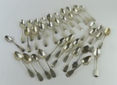 A collection of silver teaspoons of varying ages a