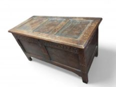 A small 19th century oak coffer on straight legs.
