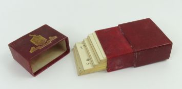 A cased set of French playing cards, probably 19th