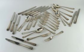 A collection of silver cutlery and flatware, compr
