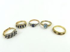 An 18ct gold sapphire and diamond seven stone half