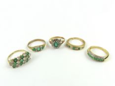 A 9ct gold emerald and diamond cluster ring, a 9ct