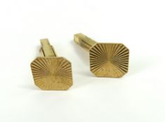 A pair of 9ct gold cufflinks, the square panels wi