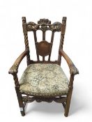 A decorative oak armchair of Carolean style with p