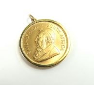 A 1975 1 ounce South African Krugerrand, in a 9ct