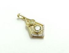 A 9ct gold white and coloured diamond pendant, dia