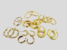 Four pairs of 9ct gold hoop earrings, together wit