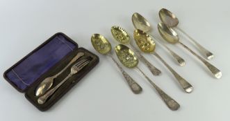 Seven silver serving spoons, along with a cased fo