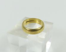 An 18ct gold wedding band, with D shape profile, f