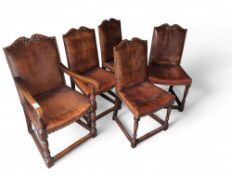 Five leather upholstered dining chairs with oak fr