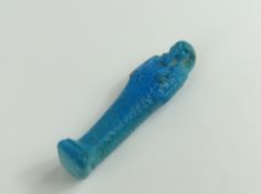 An Egyptian style faience shabti, 7cm high