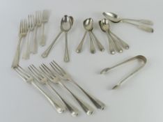 A collection of silver flatware comprising four ta