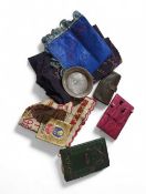 A collection of curios to include a pocket calenda