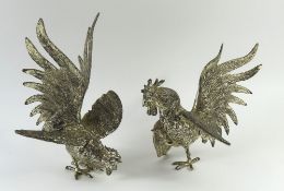 Two silver-plated models of fighting cocks