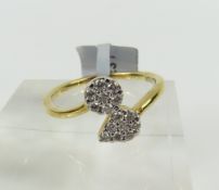 A 9ct gold Argyle diamond set ring, the stones set