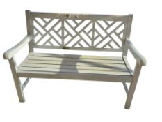 White metal garden bench