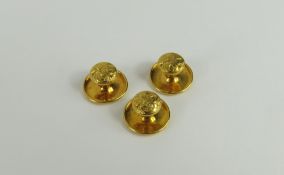 A set of three 18ct gold dress studs, each with en