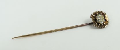 A paste set stock pin, the horseshoe shaped head s