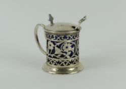 A silver lidded mustard pot